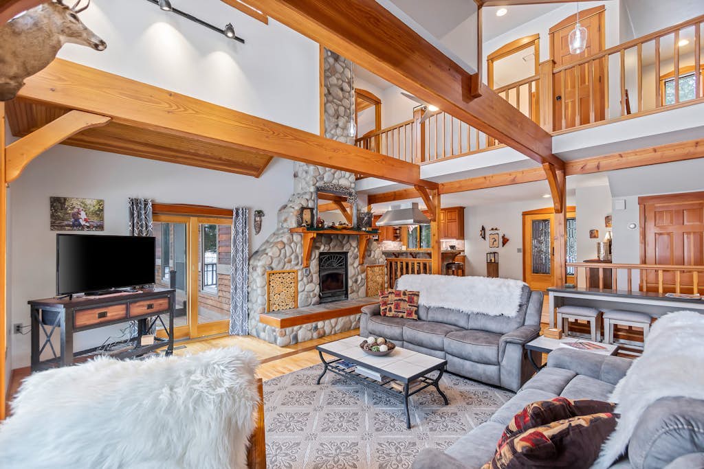 Expansive Riverfront Lodge with Dock, Game Room, Bar & Spacious Deck!