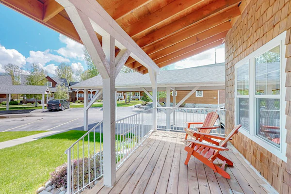 Adorable, two-story home with a furnished front porch, fireplace, & washer/dryer