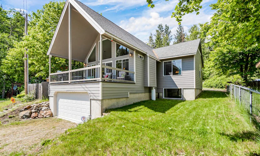 Beautiful 3-story home with lake/bay views, deck, grill, firepit & fireplace