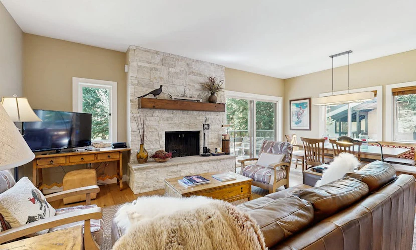 Golf course condo with ski shuttle, shared pools, & hot tub