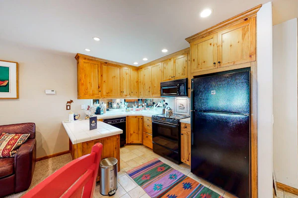 Ski-in/ski-out condo with pool, mountain view, balcony, & easy trail access