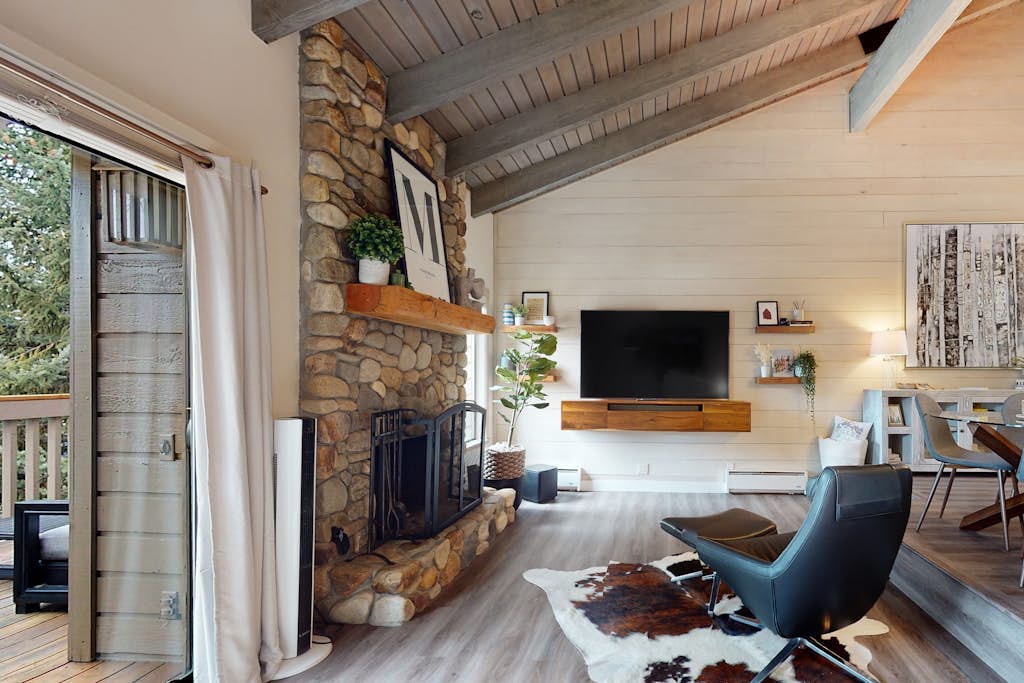 Inviting condo with skiing, pool, fireplace, mountain view, & W/D