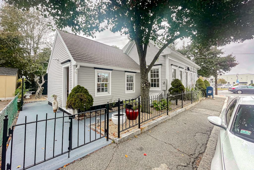 Centrally located charmer with expansive patio, board games, & central AC