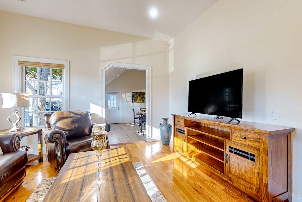 Centrally located charmer with expansive patio, board games, & central AC