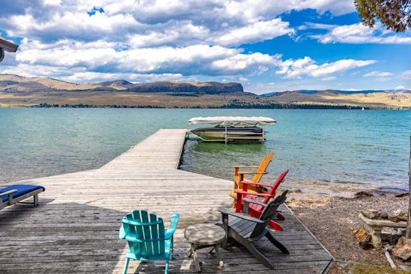Lakefront home with private beach, dock, firepit, & grill - dazzling sunset view