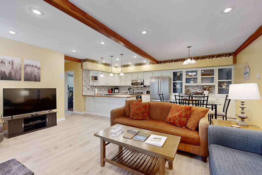 Lower-level mountain view retreat with a kitchenette & washer/dryer