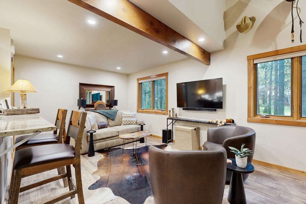 Big Fork rustic loft cabin with forest views, WiFi, 5 miles to Flathead Lake