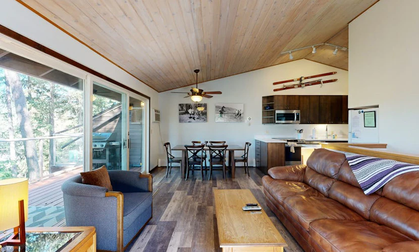 Lake-view home with private beach access, pool, hot tub & sauna