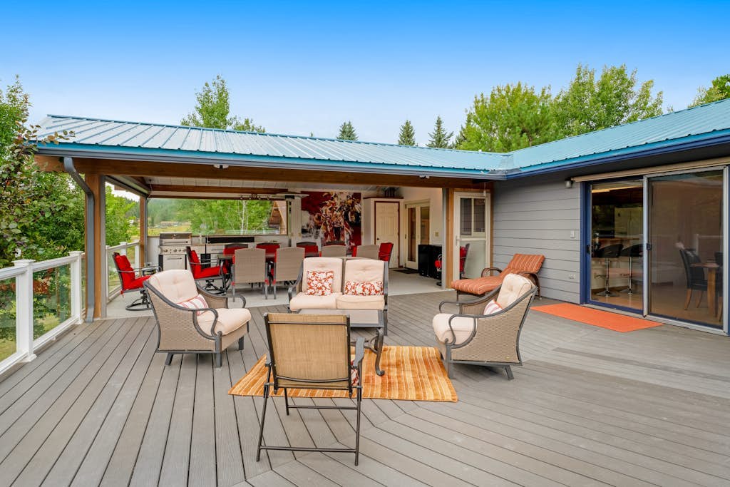 Lakefront home with dock, lake views, Ping-Pong, outdoor kitchen, private beach