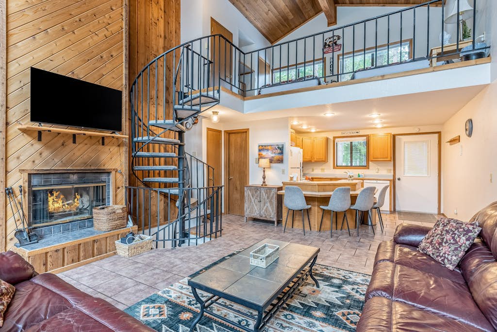 Roomy condo with deck, pool, beach, & wood finishes- near skiing & fishing