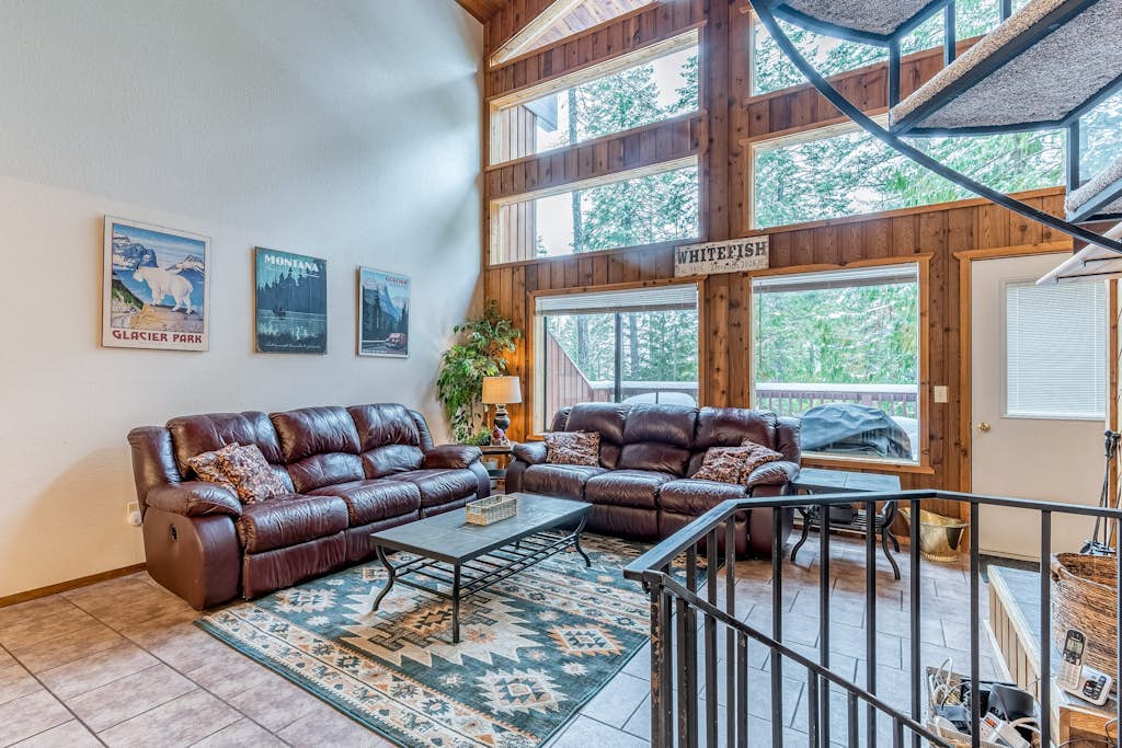 Roomy condo with deck, pool, beach, & wood finishes- near skiing & fishing
