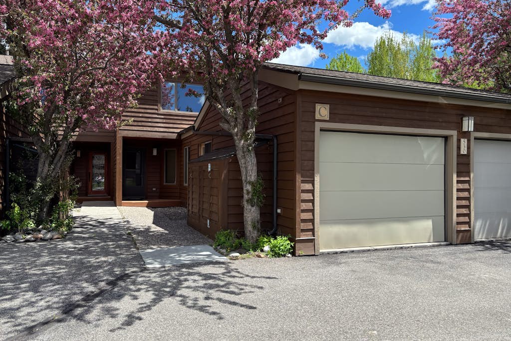 Centrally located condo with furnished deck, amazing Teton views, & fireplace