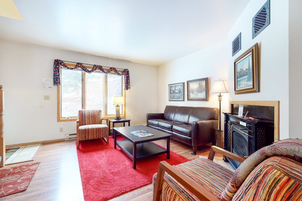 Roomy 2-story home with furnished deck, grill, fireplace, & great location