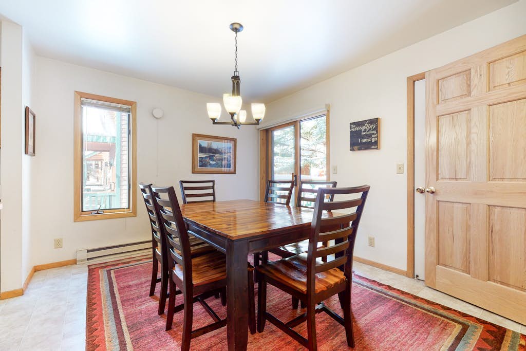 Roomy 2-story home with furnished deck, grill, fireplace, & great location