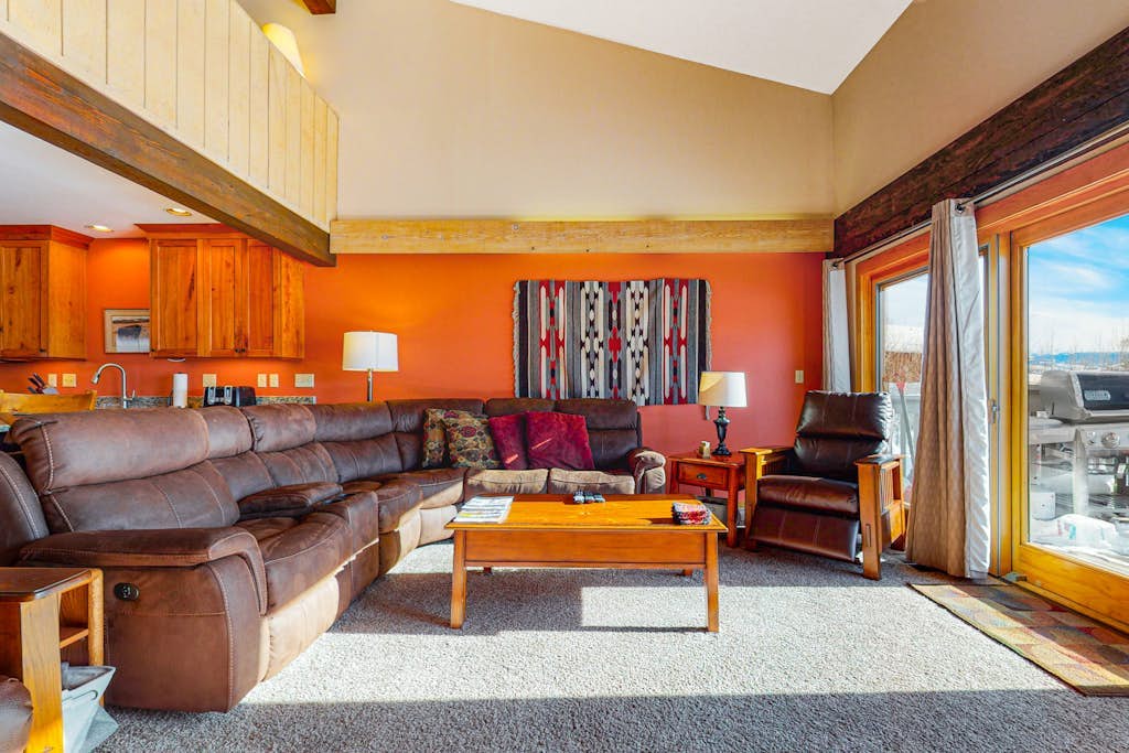 Inviting mountain condo w/private sauna, deck, mtn views, & shared hot tub/pool