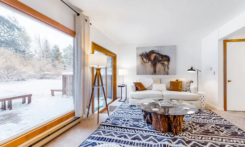 Open and inviting, two-story condo with full kitchen, patio, and wildlife views