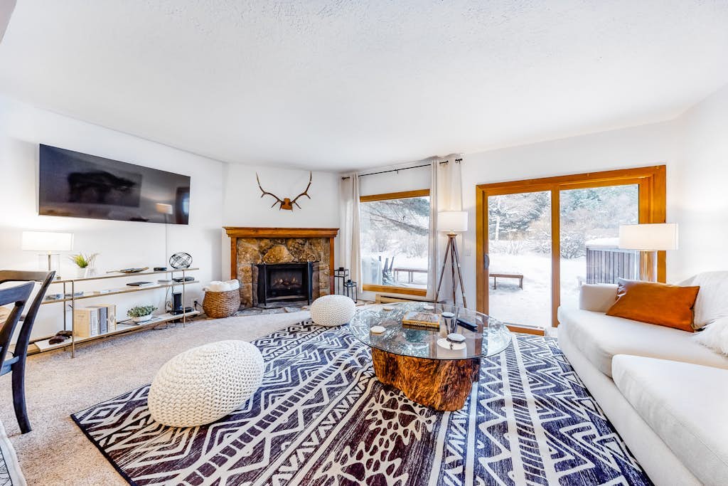 Open and inviting, two-story condo with full kitchen, patio, and wildlife views