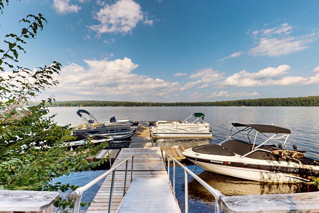 Lakefront condo with on-site pool, dock, swimming, firepit, & tennis