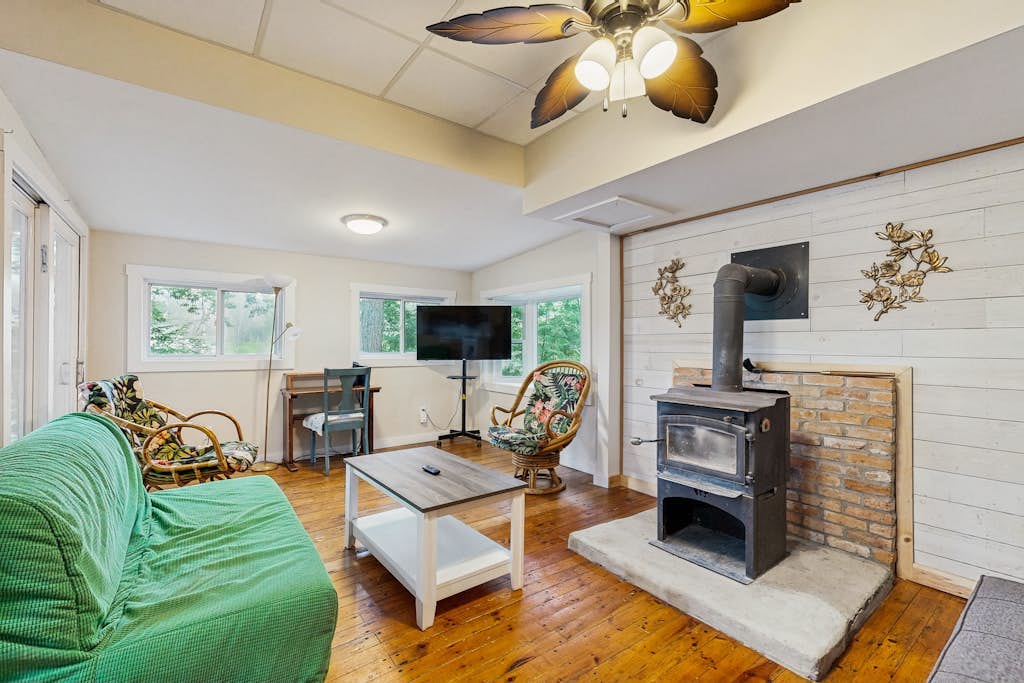 Entire lakefront home on Togus Pond with decks, canoe, firepit & great view