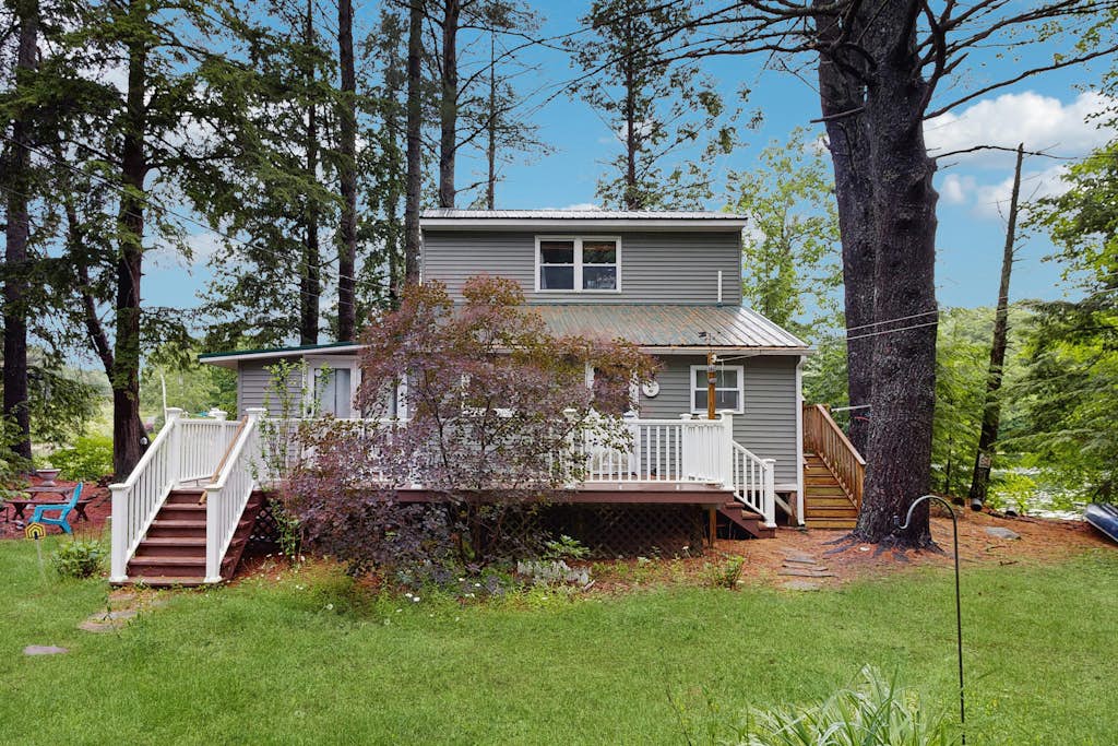Entire lakefront home on Togus Pond with decks, canoe, firepit & great view