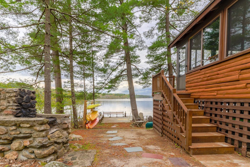 Lakefront cabin on Brandy Pond with dock, deck, firepit, kayaks & paddleboard