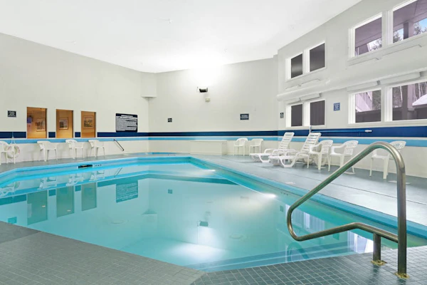Ski-in/out 2-story condo with balcony, on-site indoor pool, hot tub, sauna, W/D
