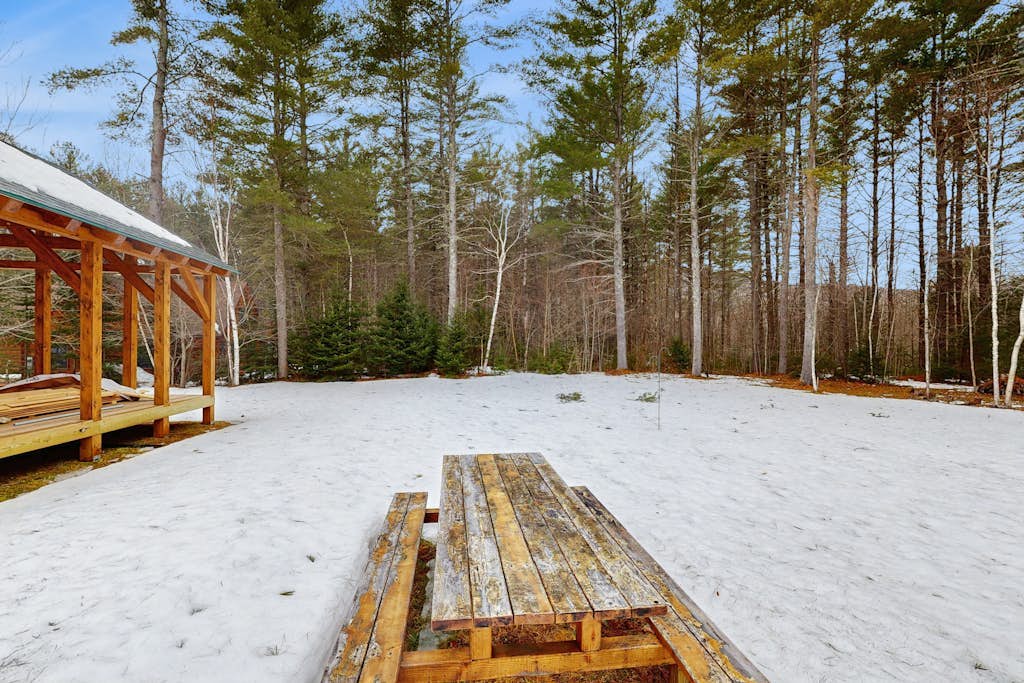 Beautiful log cabin with nearby skiing, large living spaces, and outdoor patio