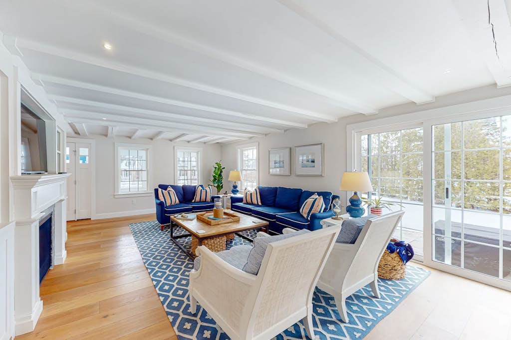 Comfortable coastal home with yard, Ping-Pong table, kayaks, surf board, & grill