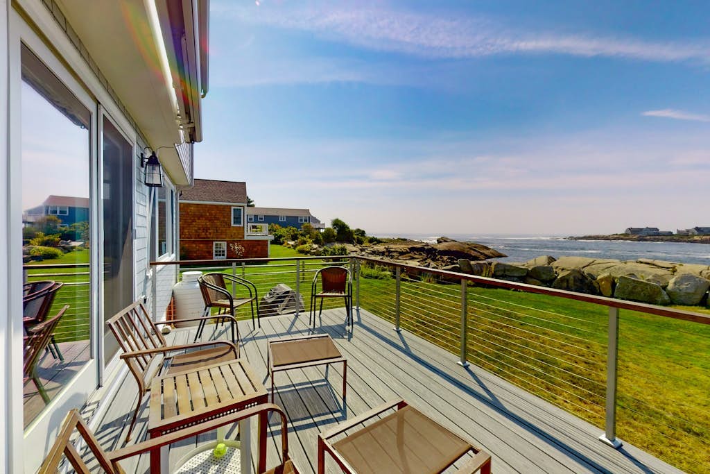 Oceanfront home with stunning views of the cove & sunset, steps to the beach