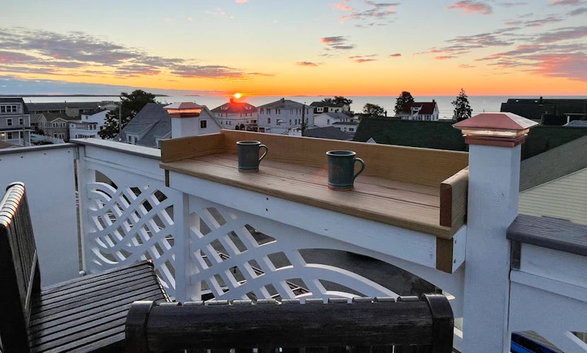 Ocean-view condo with gorgeous sunrises, deck, & WiFi - walk to beach & pier