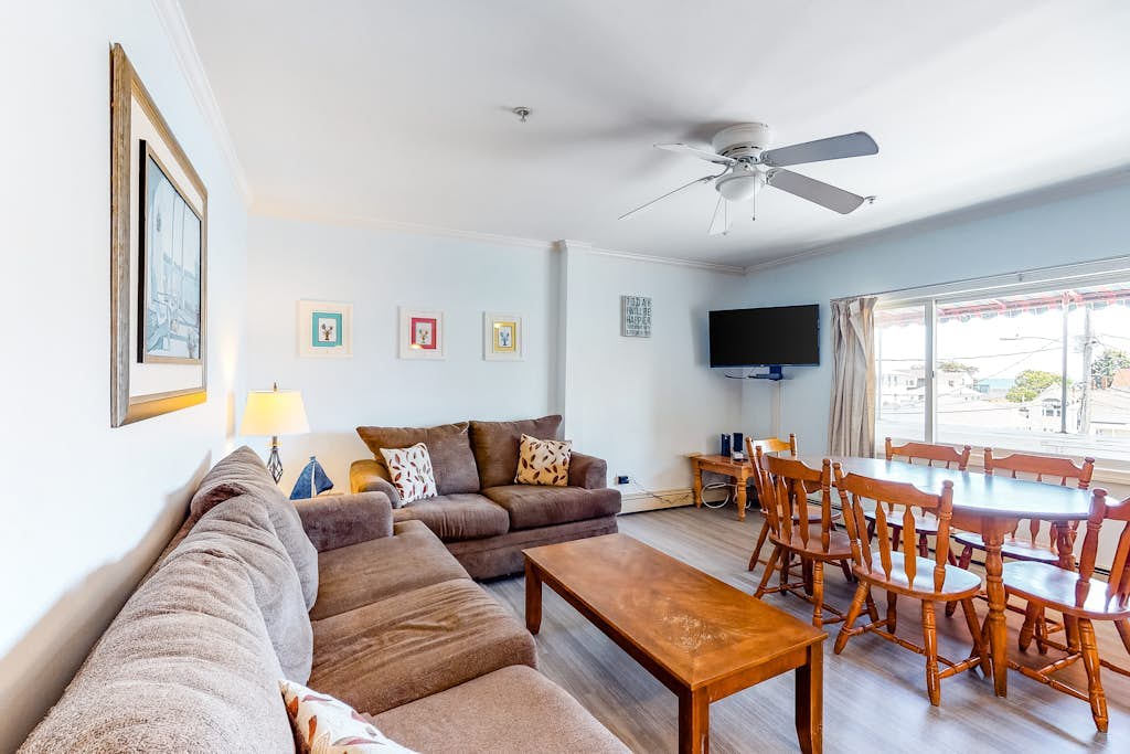 Ocean-view condo with gorgeous sunrises, deck, & WiFi - walk to beach & pier