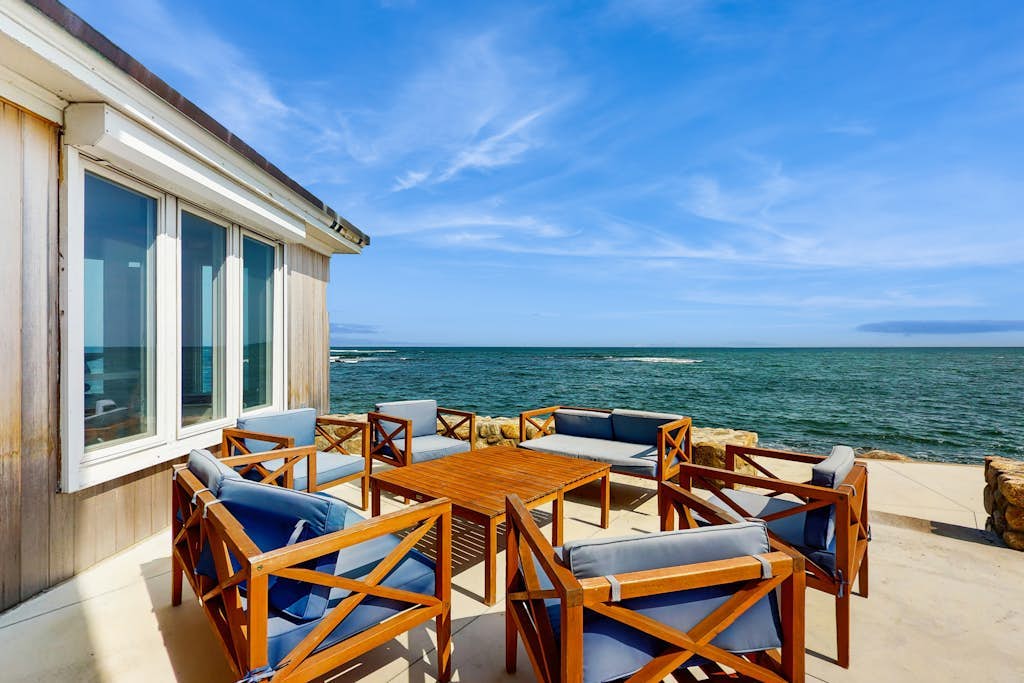 Coastal gem on the water with beach access, gorgeous views & spacious layout
