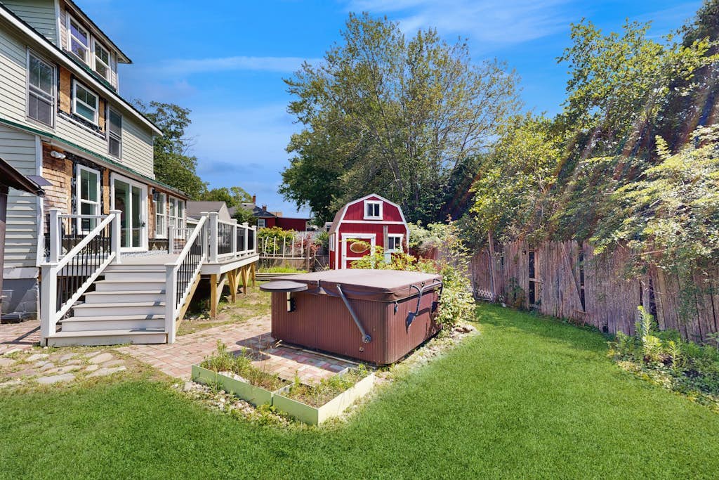 Bright & breezy beach house w/ private backyard, central AC, & relaxing hot tub