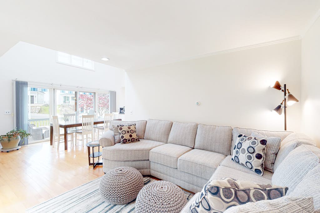 Charming home with ocean view, firepit, deck, golf nearby, & W/D