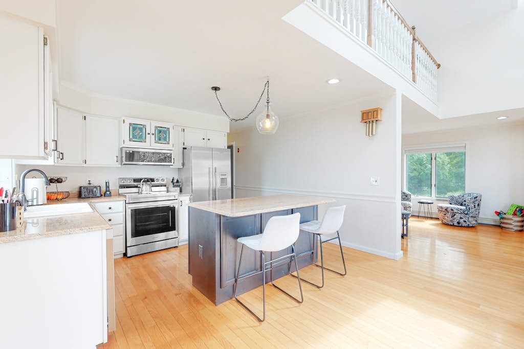 Charming home with ocean view, firepit, deck, golf nearby, & W/D