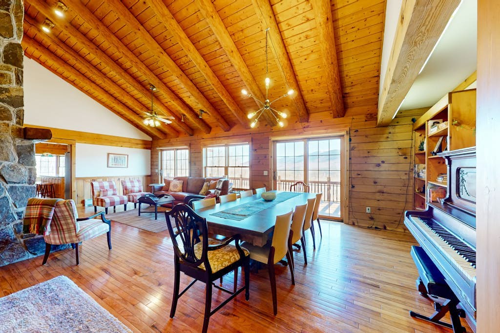Custom log home with enormous  deck & stunning mountain views