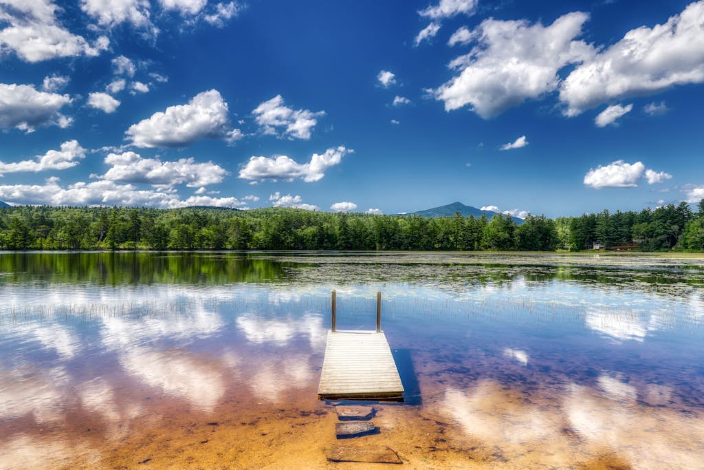Lakefront home with private beach & dock - close to skiing