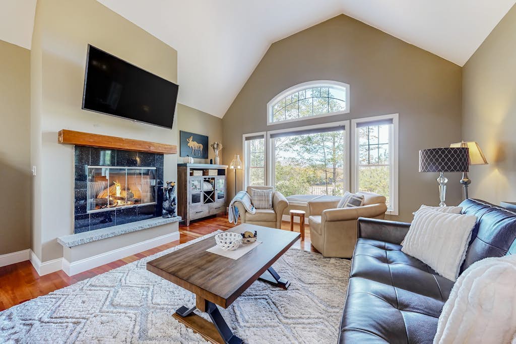 Lovely home with water view, hot tub, fireplace, & washer/dryer