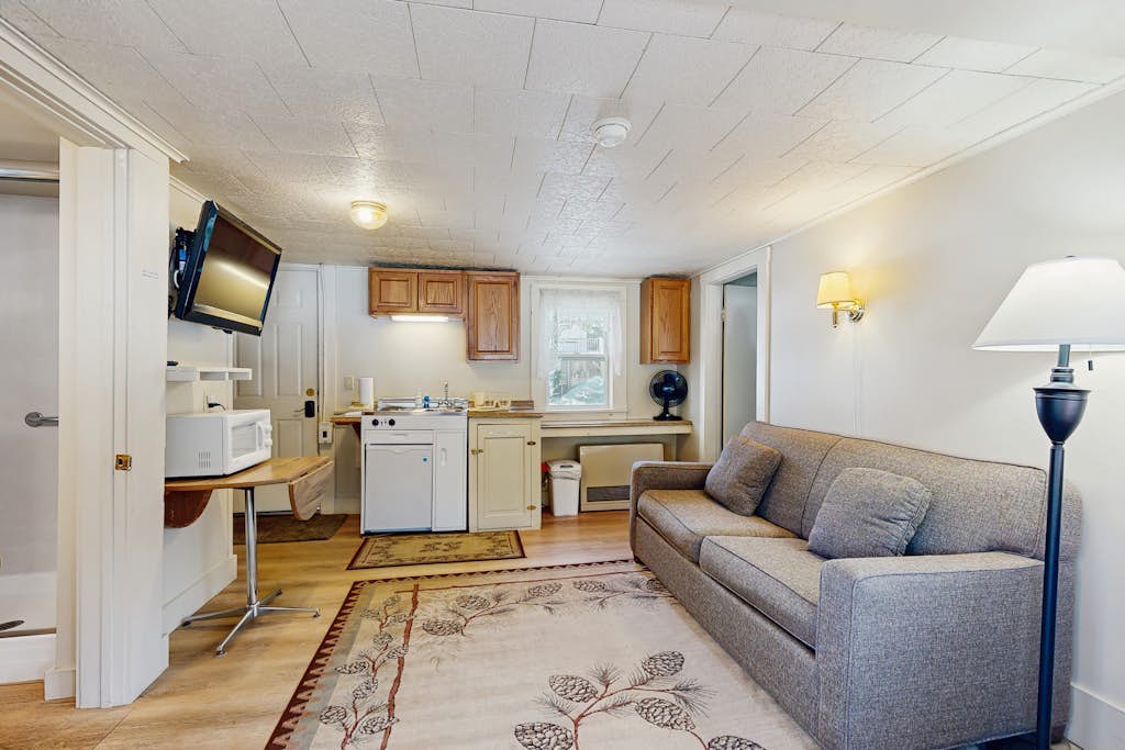 Cute Riverfront Cabin in Great Location w/ Shared Pool, Kitchenette, & Free WiFi