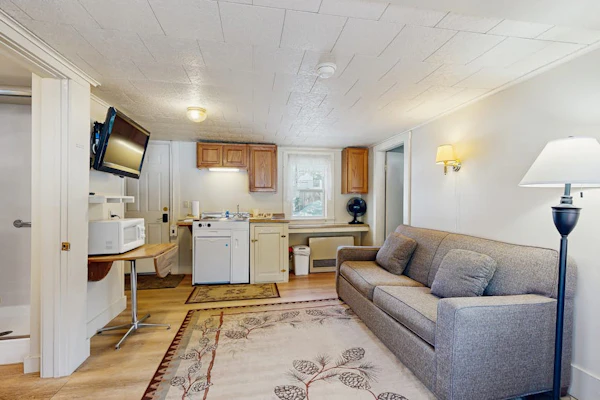 Cute Riverfront Cabin in Great Location w/ Shared Pool, Kitchenette, & Free WiFi