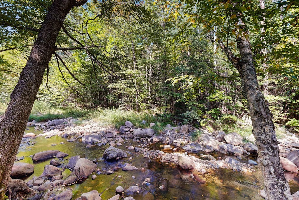 Country home w/ stream, yard, garden, snowmobile access, nr Santa's Village
