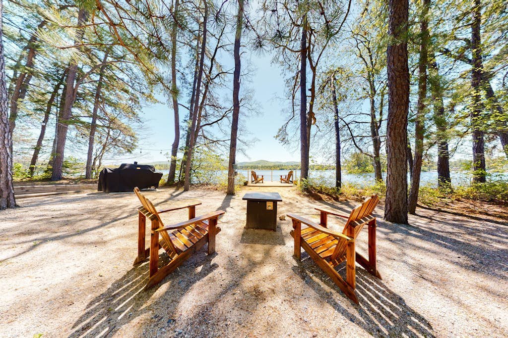 Homey lakeside property w/ one house, two cottages, mtn. views, & private beach