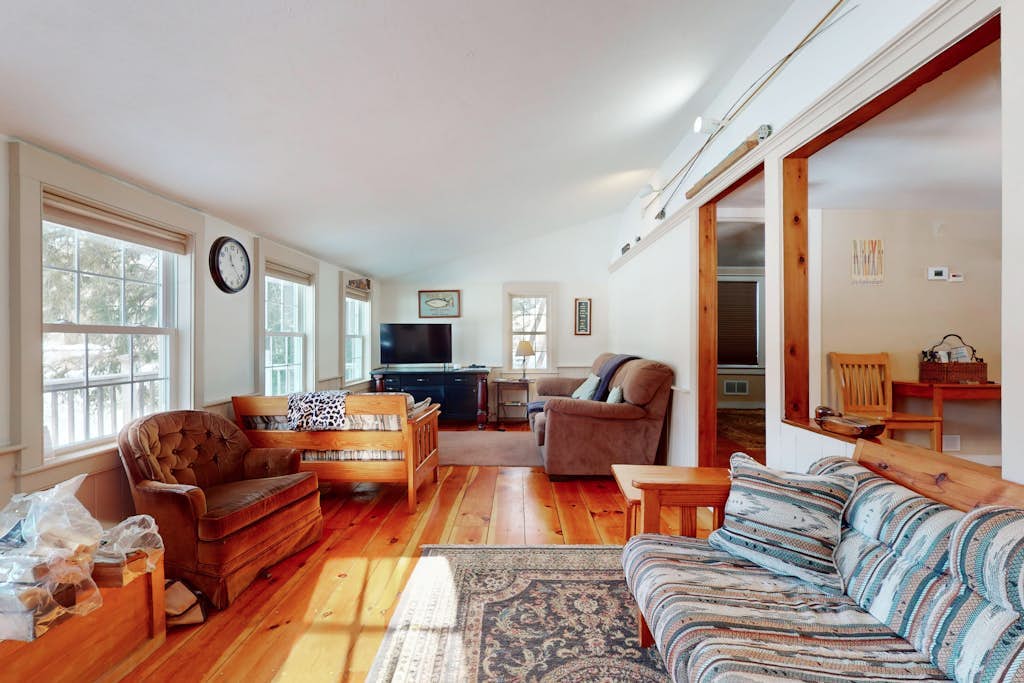 Quaint lakefront home with a fire pit and beautiful views