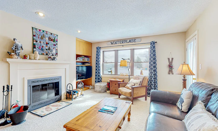 Ski-in/out condo with mountain views, fireplace, pool, & hot tub