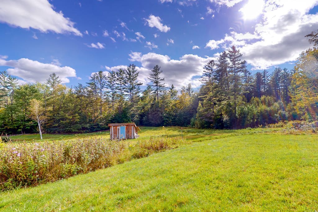 Delightful updated farmhouse with original features, patio, and & W/D
