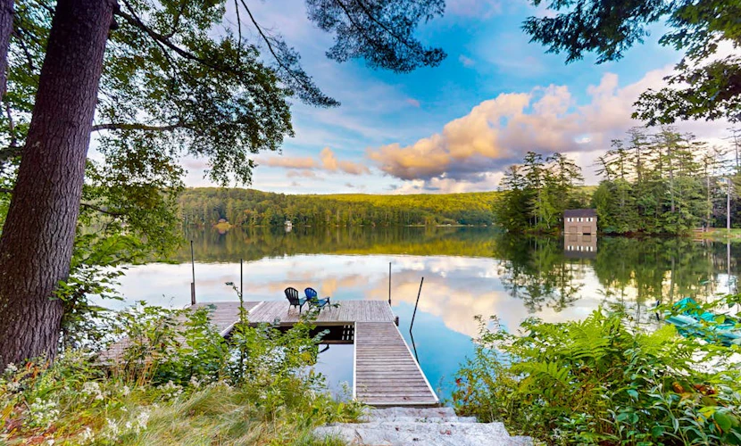 Renovated lakefront cottage w/ hot tub, dock, kayaks, swim platform, & firepit