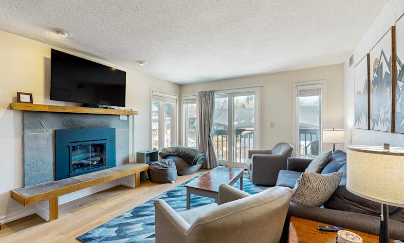 Ski-in/out mountainside condo w/ mountain views, private deck, fireplace, w/d