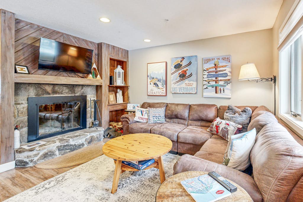 Mountain-view condo with private balcony, fireplace, & updated interior