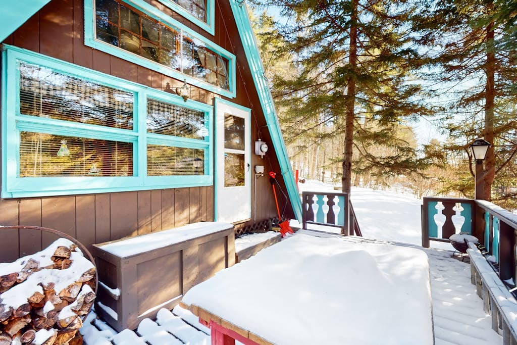 Charming gingerbread A-frame situated on 3 acres, woodstove, A/C, deck