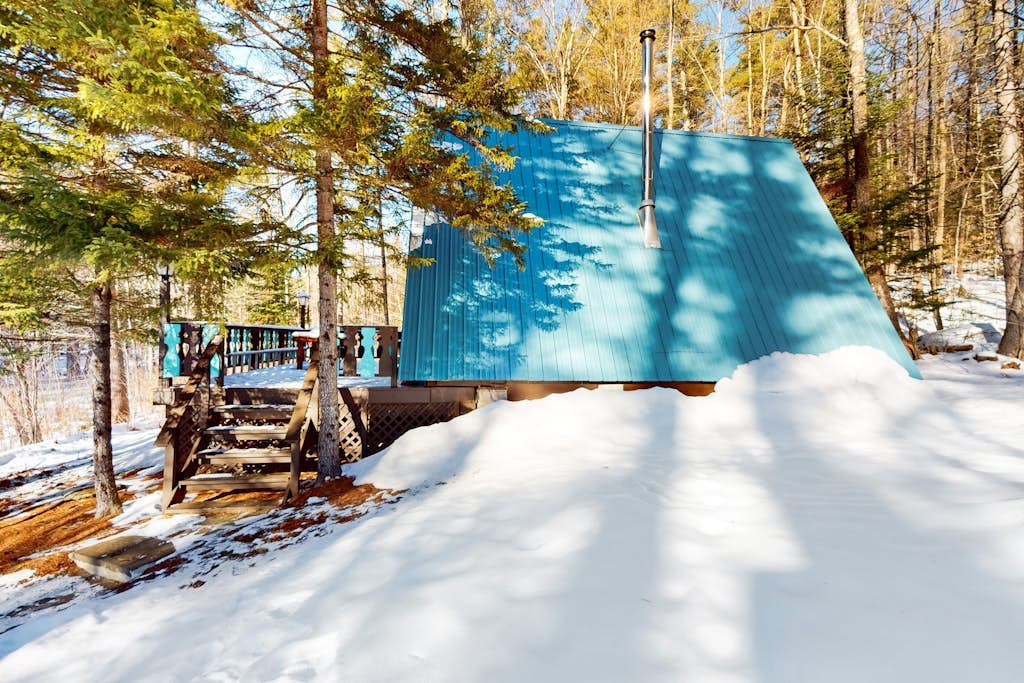 Charming gingerbread A-frame situated on 3 acres, woodstove, A/C, deck